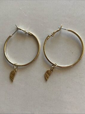 Small hoop earrings with angel wing charm